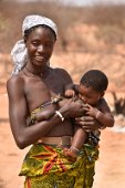 14: Mucui woman feeding