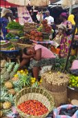 22: Saleswoman resting in Makola market, Accra