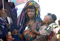 20: Bororo woman carrying boy