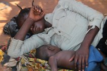23: Mother and son Gowa sleeping at Chirundu market